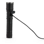 Black LED flashlight with a cable on a white background
