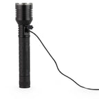 Black flashlight with a cable on a white background