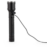 Black flashlight with a cable on a white background