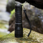 Tactical Flashlight with water droplets
