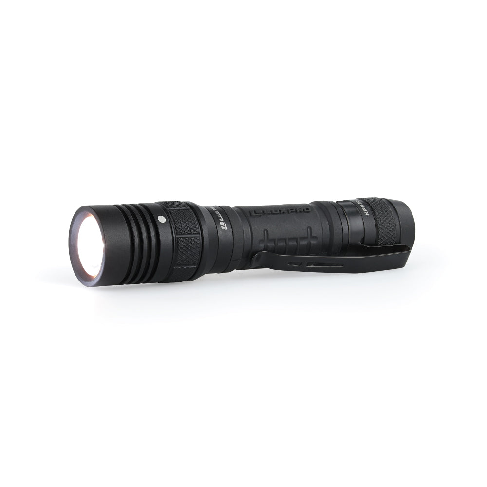 Horizontal LED tactical flashlight with flashlight turned on 